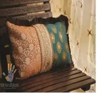 Peach and teal cushion cover