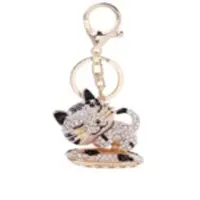 Pussy Stoned Metal Keychain