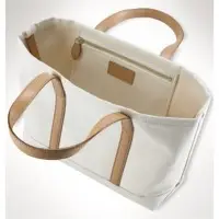 Bag with beige leather strap