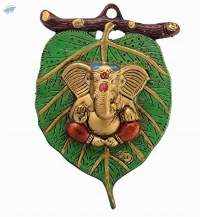 Lord Ganesh in Red Dhoti on Green Leaf Wall