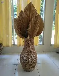 Vase Pot filled with Palm Leaves